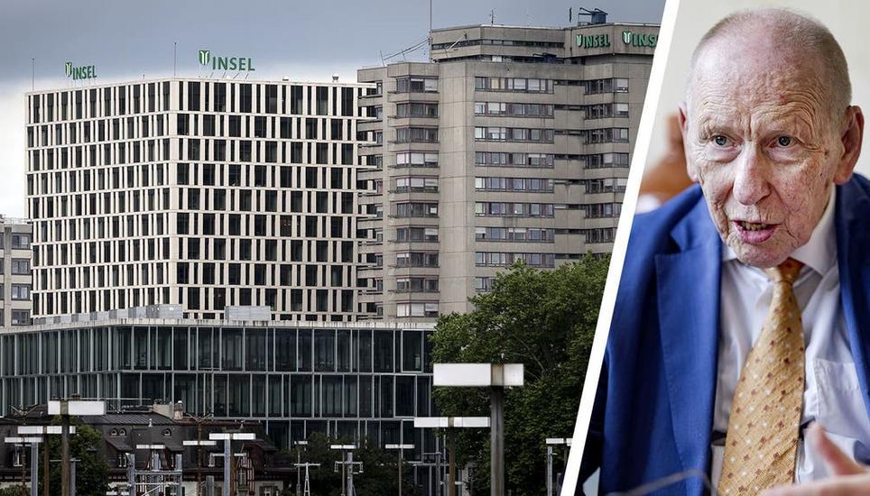 Dunkle Wolken über dem Inselspital. Bild: Anthony Anex/Keystone