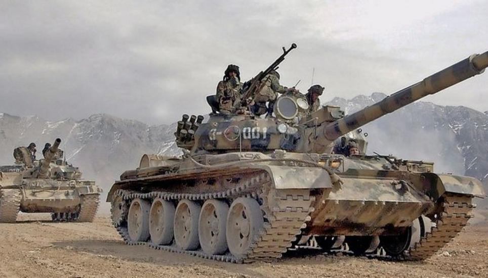 Newly-trained Afghan National Army (ANA) soldiers participate in a joint military exercise with soldiers from the NATO-led International Security Assistance Force (ISAF) on the outskirits of Kabul, on Thursday 16 February 2006. Afghanistan is recreating t