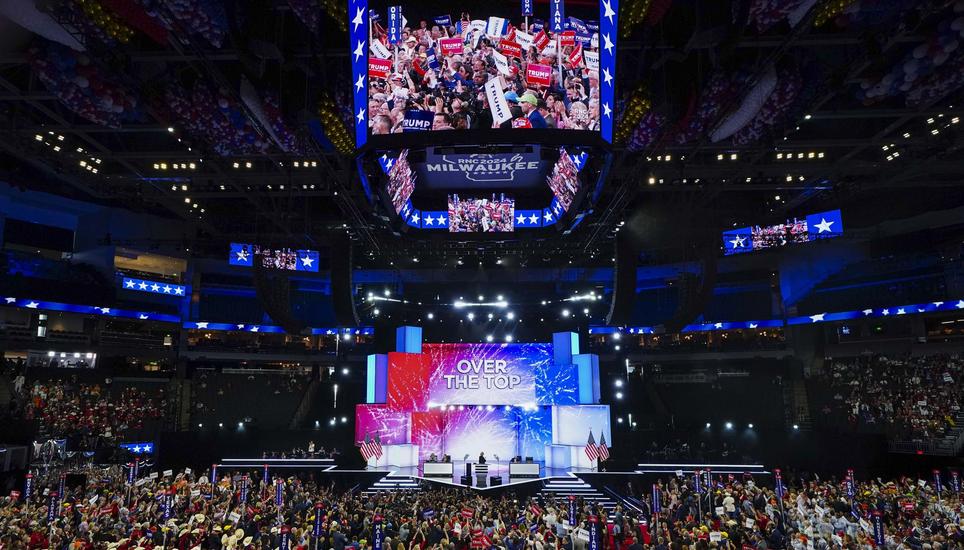 epa11480503 Delegates celebrate as Florida's votes put former president Donald J. Trump over the top during the nomination process for former President Donald J. Trump at the Republican National Convention (RNC) in the Fiserv Forum in Milwaukee, Wisconsin
