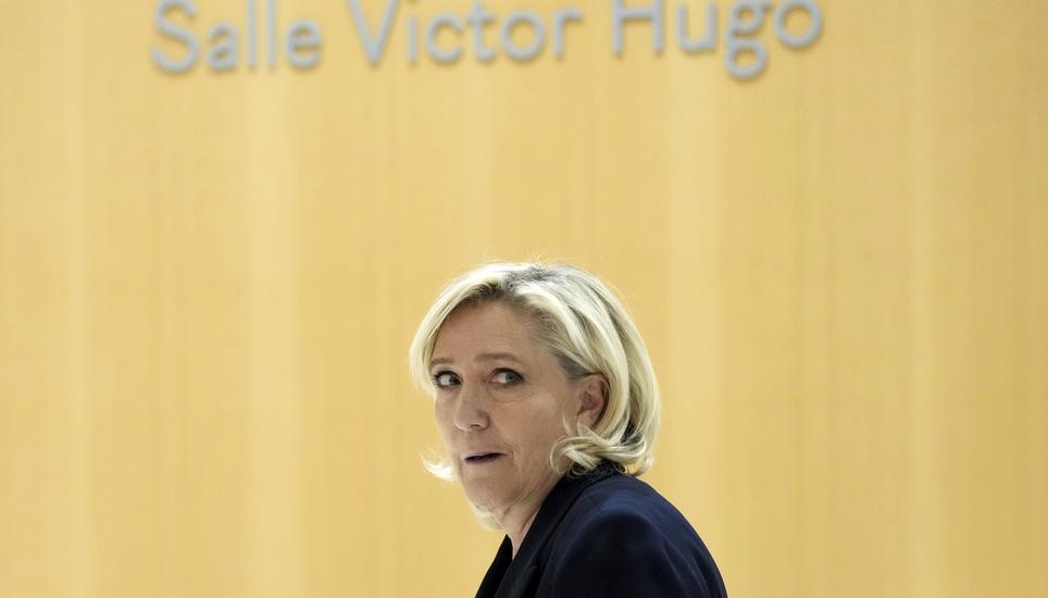 French far-right leader Marine Le Pen arrives at the courtroom for the trial over the suspected embezzlement of European Parliament funds, Wednesday, Nov. 6, 2024 in Paris. (AP Photo/Aurelien Morissard)