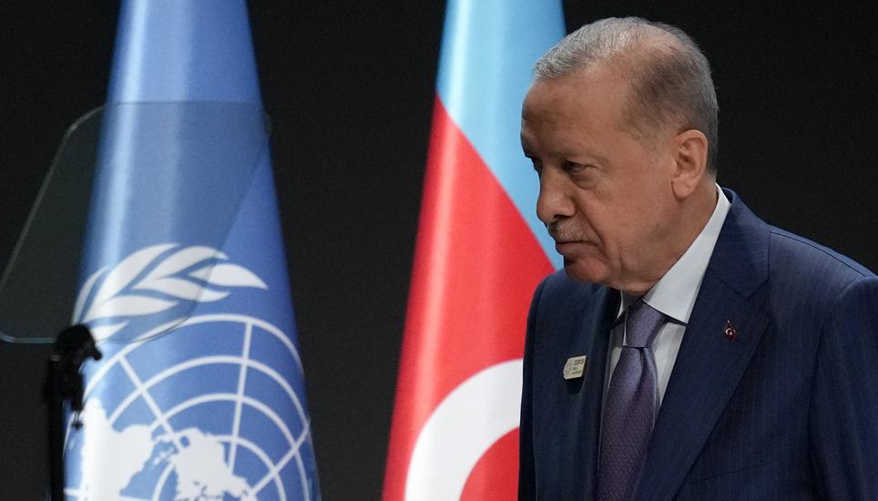 Turkey President Recep Tayyip Erdogan leaves after speaking during a plenary session at the COP29 U.N. Climate Summit, Tuesday, Nov. 12, 2024, in Baku, Azerbaijan. (AP Photo/Rafiq Maqbool)