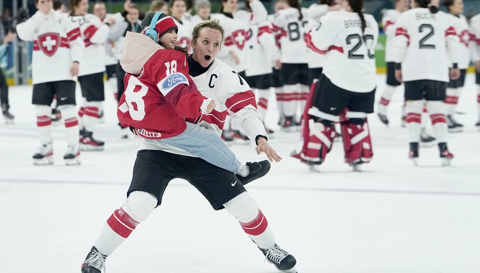 Switzerland's Lara Stalder (7) celebrates after a women's ice hockey bronze medal game between Switzerland and Sweden at the 2026 Winter Olympics, in Milan, Italy, Thursday, Feb. 19, 2026. (AP Photo/Petr David Josek)