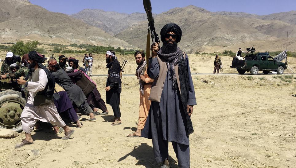Taliban soldiers stand guard in Panjshir province northeastern of Afghanistan, Wednesday, Sept. 8, 2021. (AP Photo/Mohammad Asif Khan)