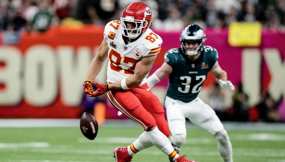 Kansas City Chiefs tight end Travis Kelce (87) can't make the catch as Philadelphia Eagles safety Reed Blankenship (32) pursues during the first half of the NFL Super Bowl 59 football game, Sunday, Feb. 9, 2025, in New Orleans. (AP Photo/Frank Franklin II