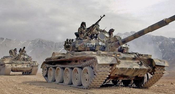 Newly-trained Afghan National Army (ANA) soldiers participate in a joint military exercise with soldiers from the NATO-led International Security Assistance Force (ISAF) on the outskirits of Kabul, on Thursday 16 February 2006. Afghanistan is recreating t