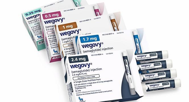 This image provided by Novo Nordisk in January 2023, shows packaging for the company's Wegovy drug. Children struggling with obesity should be evaluated and treated early and aggressively, with medications for kids as young as 12 and surgery for those as 