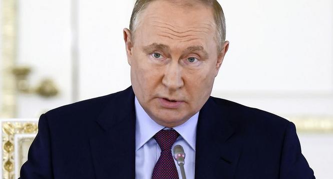 Russian President Vladimir Putin meets with business representatives on the development of the automobile industry on the sidelines of the St. Petersburg International Economic Forum in St. Petersburg, Russia, Thursday, June 16, 2022. (Alexander Ryumin, S