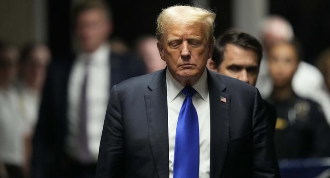 Former President Donald Trump walks to make comments to members of the media after being found guilty on 34 felony counts of falsifying business records in the first degree at Manhattan Criminal Court, Thursday, May 30, 2024, in New York. Donald Trump bec