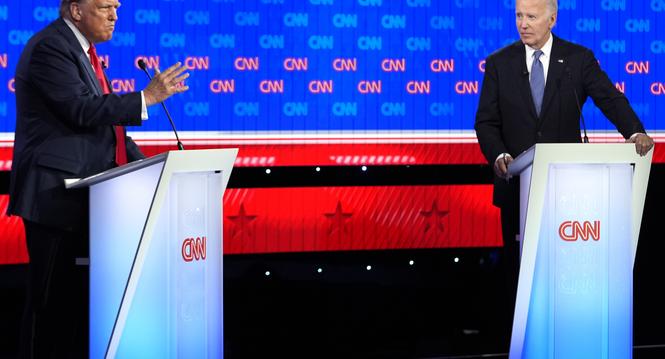 President Joe Biden, right, and Republican presidential candidate former President Donald Trump, left, participate in a presidential debate hosted by CNN, Thursday, June 27, 2024, in Atlanta. (AP Photo/Gerald Herbert)