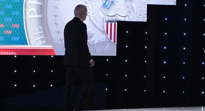 President Joe Biden walks off stage during the break of a presidential debate with Republican presidential candidate former President Donald Trump hosted by CNN, Thursday, June 27, 2024, in Atlanta. (AP Photo/Gerald Herbert)