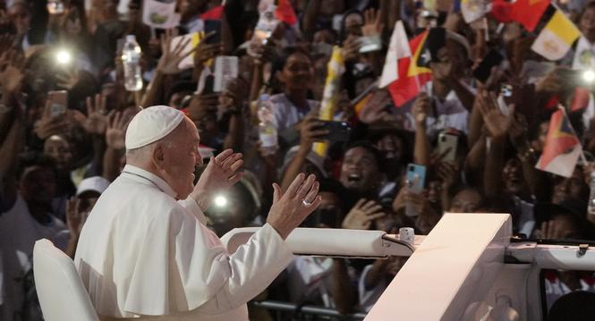 Pope Francis gestures as he leaves after leading a holy mass at Tasitolu park in Dili, East Timor, Tuesday, Sept. 10, 2024. (AP Photo/Dita Alangkara, Pool)
