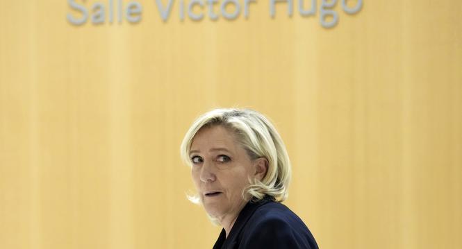 French far-right leader Marine Le Pen arrives at the courtroom for the trial over the suspected embezzlement of European Parliament funds, Wednesday, Nov. 6, 2024 in Paris. (AP Photo/Aurelien Morissard)