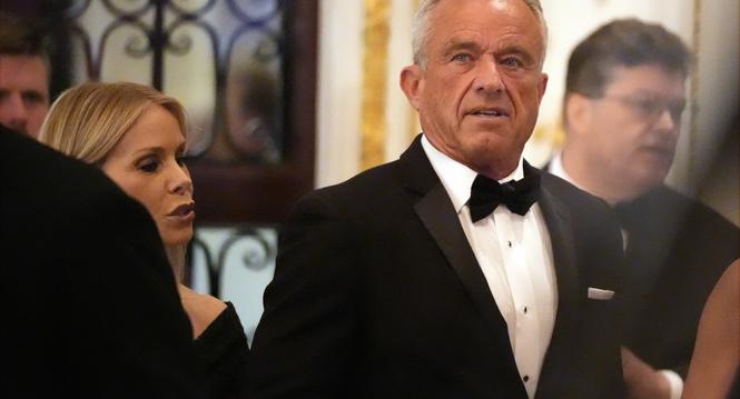 Robert F. Kennedy Jr., and his wife Cheryl Hines arrive before President-elect Donald Trump speaks during an America First Policy Institute gala at his Mar-a-Lago estate, Thursday, Nov. 14, 2024, in Palm Beach, Fla. (AP Photo/Alex Brandon)