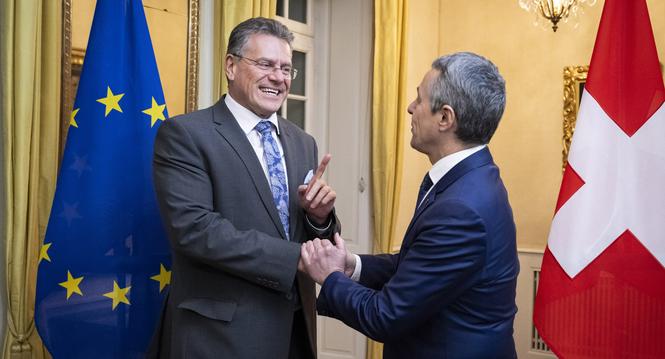 epa11744090 Maros Sefcovic (L), Executive Vice-President of the European Commission, and Swiss Federal Councillor Ignazio Cassis (R) shake hands during a working visit at the Lohn country residence of the Swiss government in Kehrsatz near Bern, Switzerlan