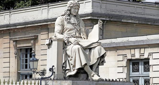 The statue of French statesman Jean-Baptiste Colbert, who served as Finance minister from 1661 until his death in 1683 under the rule of King Louis XIV, is placed in front of the French National Assembly in Paris Wednesday June 10, 2020. Colbert, is a fig