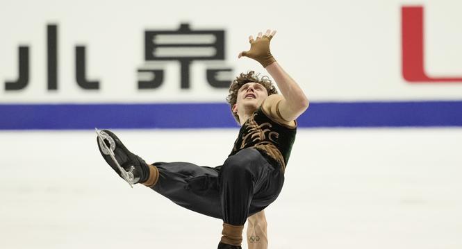 Lukas Britschgi, of Switzerland, performs during the men' free skating program in the ISU Grand Prix of Figure Skating - NHK Trophy in Kadoma, east of Osaka, western Japan, Saturday, Nov. 8, 2025. (AP Photo/Hiro Komae)