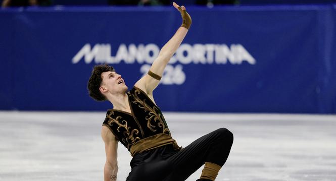 Lukas Britschgi of Switzerland competes during the men's free skate program in figure skating at the 2026 Winter Olympics, in Milan, Italy, Friday, Feb. 13, 2026. (AP Photo/Ashley Landis)