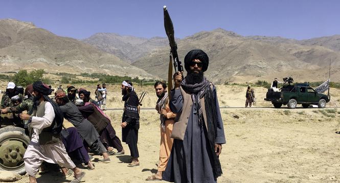 Taliban soldiers stand guard in Panjshir province northeastern of Afghanistan, Wednesday, Sept. 8, 2021. (AP Photo/Mohammad Asif Khan)