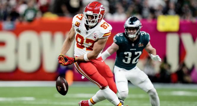 Kansas City Chiefs tight end Travis Kelce (87) can't make the catch as Philadelphia Eagles safety Reed Blankenship (32) pursues during the first half of the NFL Super Bowl 59 football game, Sunday, Feb. 9, 2025, in New Orleans. (AP Photo/Frank Franklin II