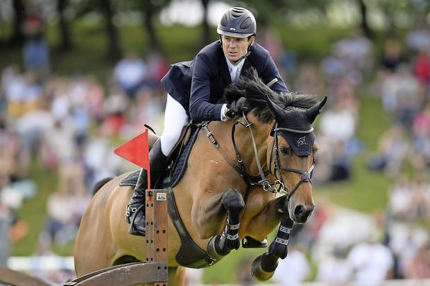 Beat Maendli of Switzerland on Dibatsja, during the "Speed and Handiness (Grosses Jagdspringen)" competition, at the Longines CSIO horsejumping in St. Gallen, Switzerland, on Saturday, June 2, 2018. (KEYSTONE/Gian Ehrenzeller)